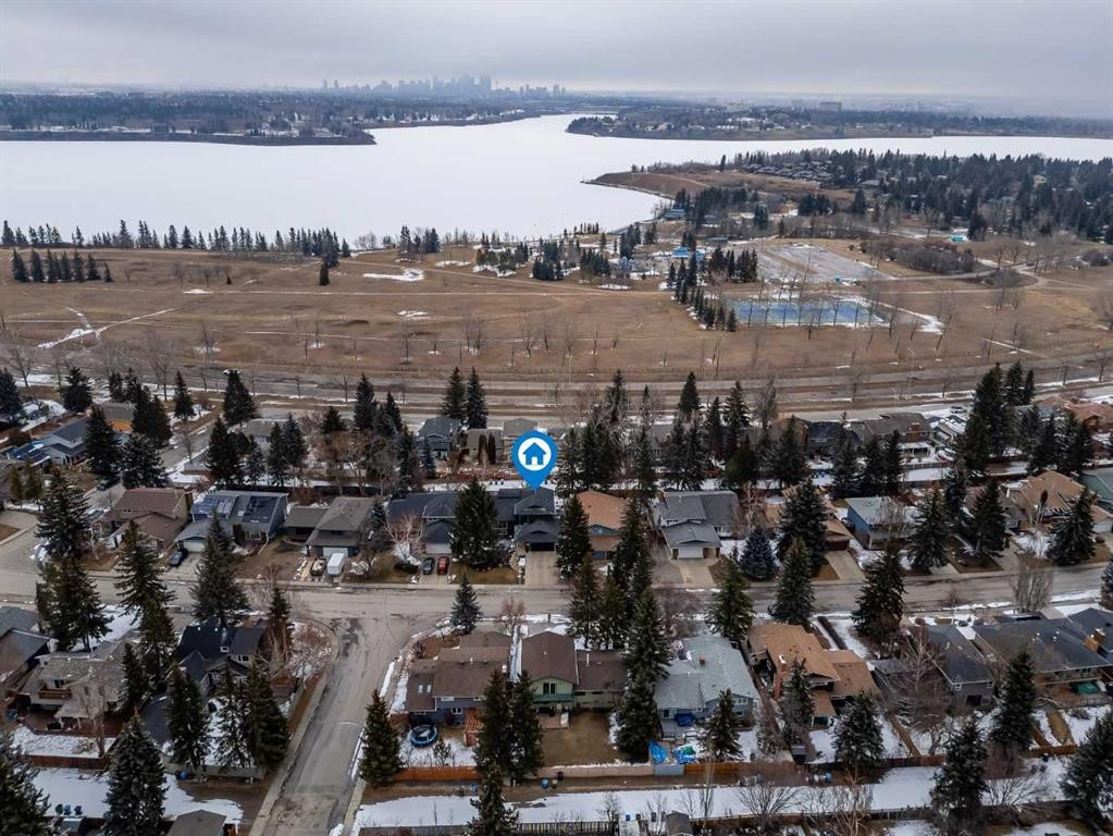 168 Oakside Circle, Calgary, AB - Outdoor With Body Of Water With View