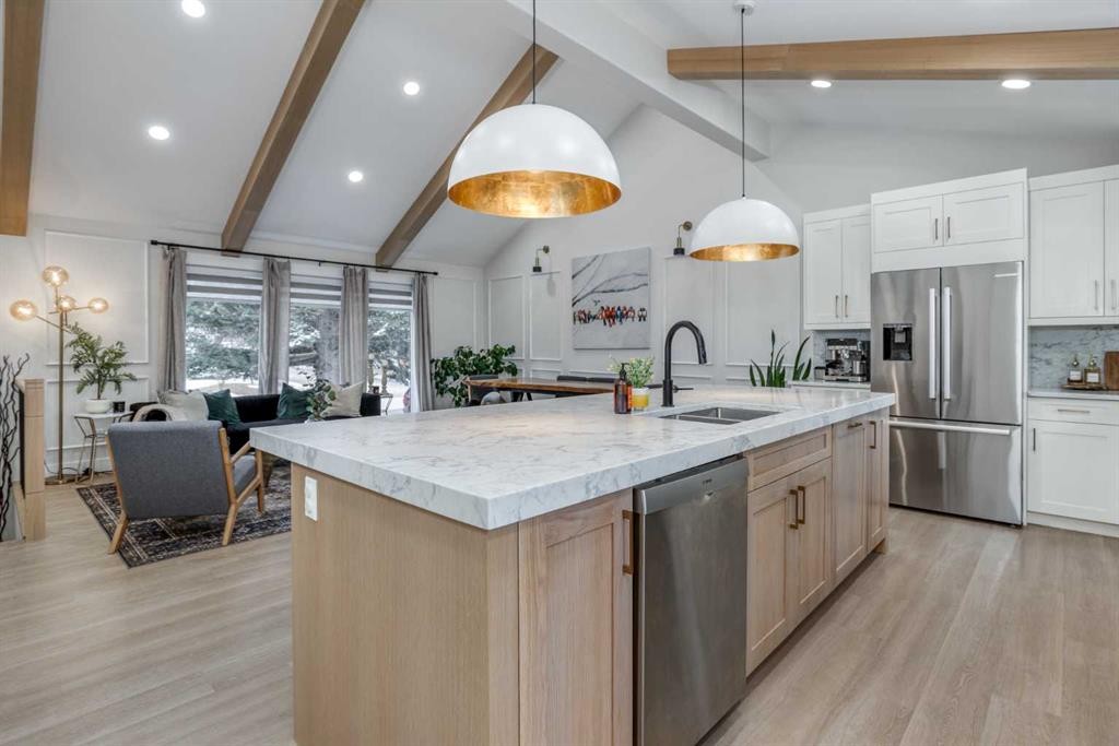 168 Oakside Circle, Calgary, AB - Indoor Photo Showing Kitchen With Double Sink With Upgraded Kitchen