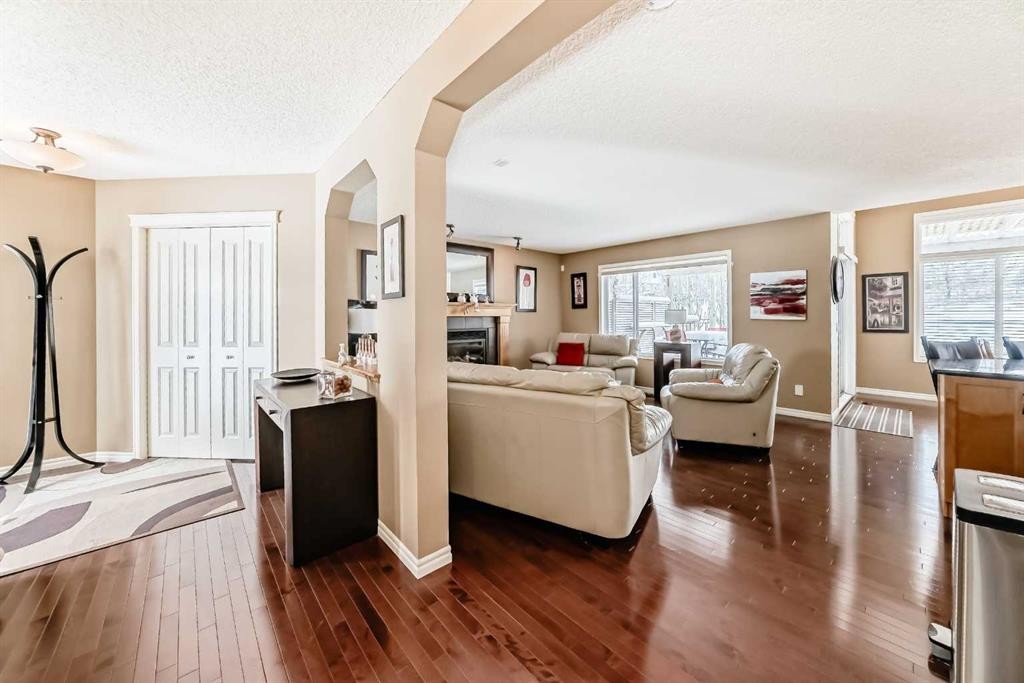 41 Kincora Drive Nw, Calgary, AB - Indoor Photo Showing Living Room With Fireplace