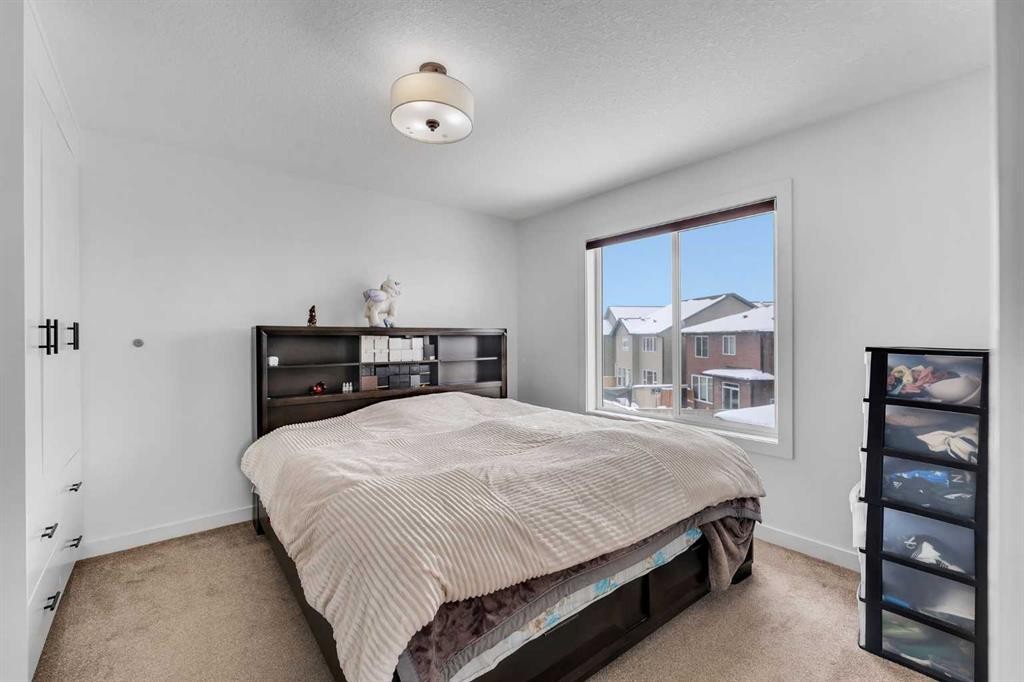 43 Saddlelake Manor Ne, Calgary, AB - Indoor Photo Showing Bedroom