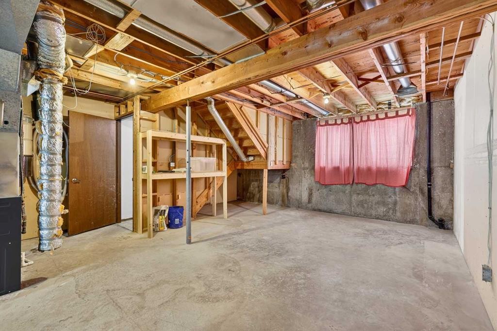 1502 Ranchlands Way Nw, Calgary, AB - Indoor Photo Showing Basement