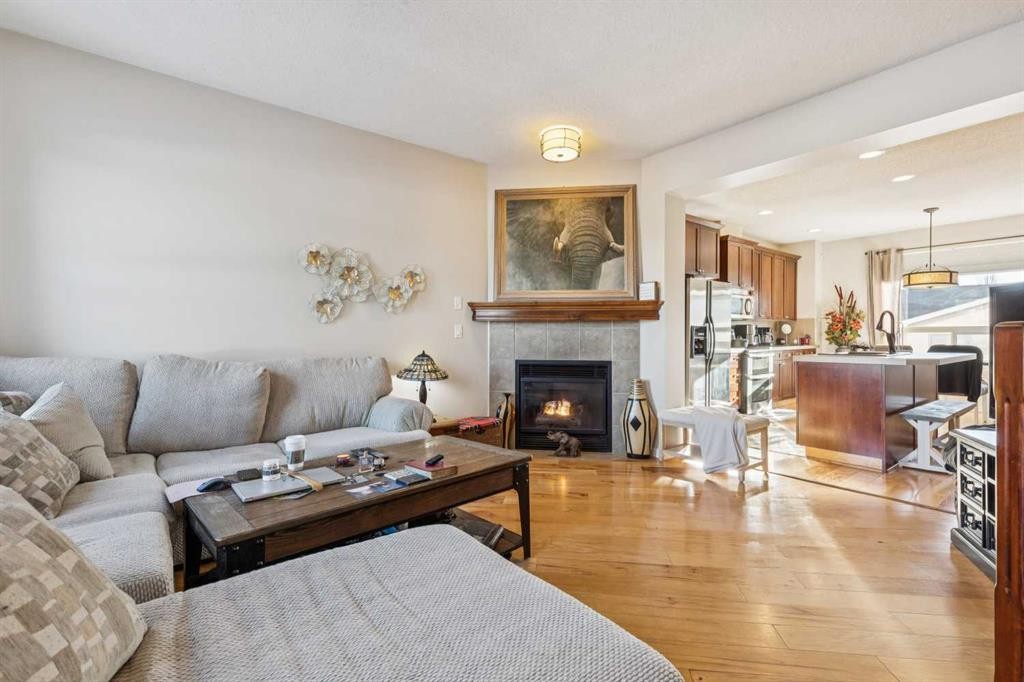 15008 Prestwick Boulevard Se, Calgary, AB - Indoor Photo Showing Living Room With Fireplace