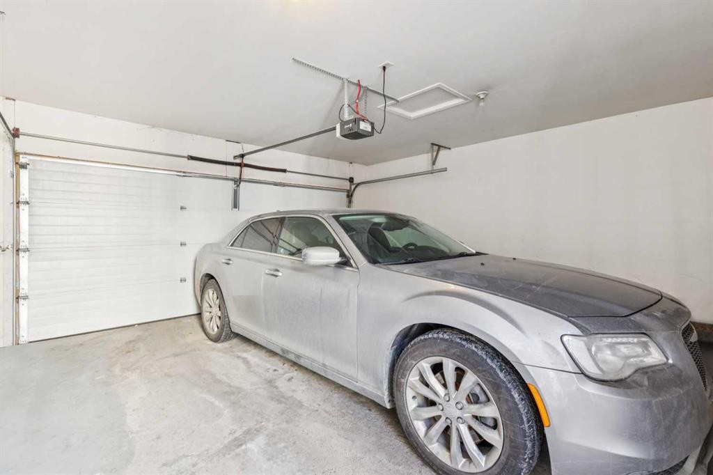 15008 Prestwick Boulevard Se, Calgary, AB - Indoor Photo Showing Garage