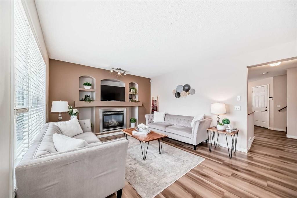 79 Saddleridge Close Ne, Calgary, AB - Indoor Photo Showing Living Room With Fireplace