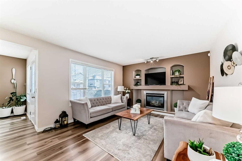 79 Saddleridge Close Ne, Calgary, AB - Indoor Photo Showing Living Room With Fireplace