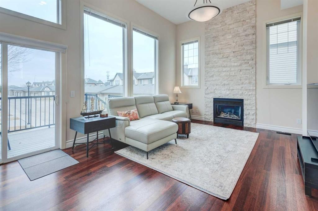 14 Everridge Common Sw, Calgary, AB - Indoor Photo Showing Living Room With Fireplace