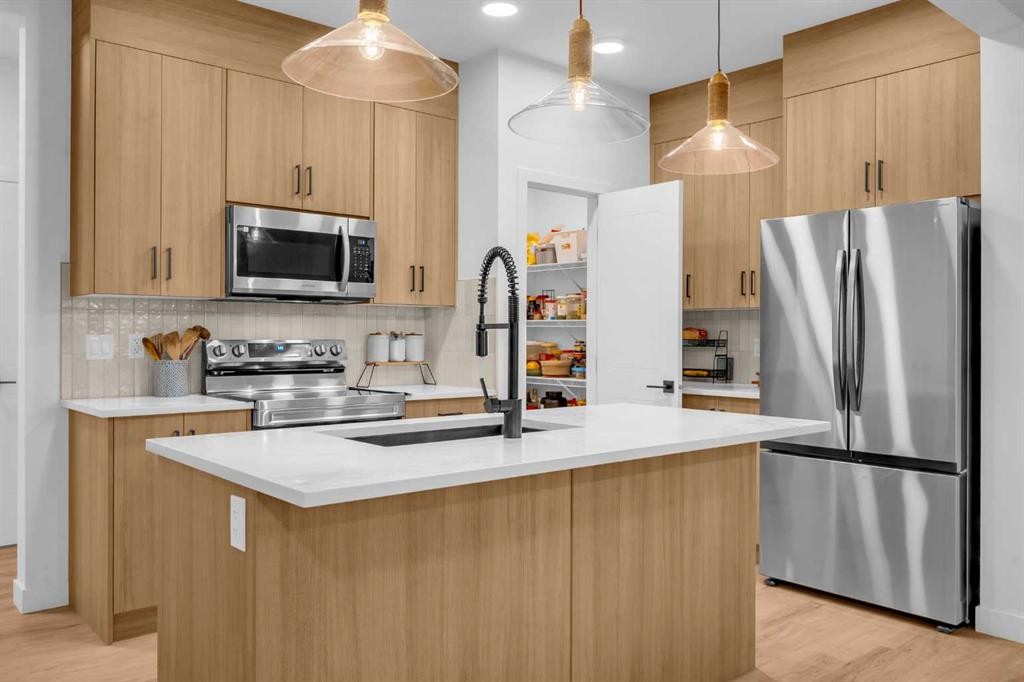 288 Sora Terrace Se, Calgary, AB - Indoor Photo Showing Kitchen With Stainless Steel Kitchen With Upgraded Kitchen