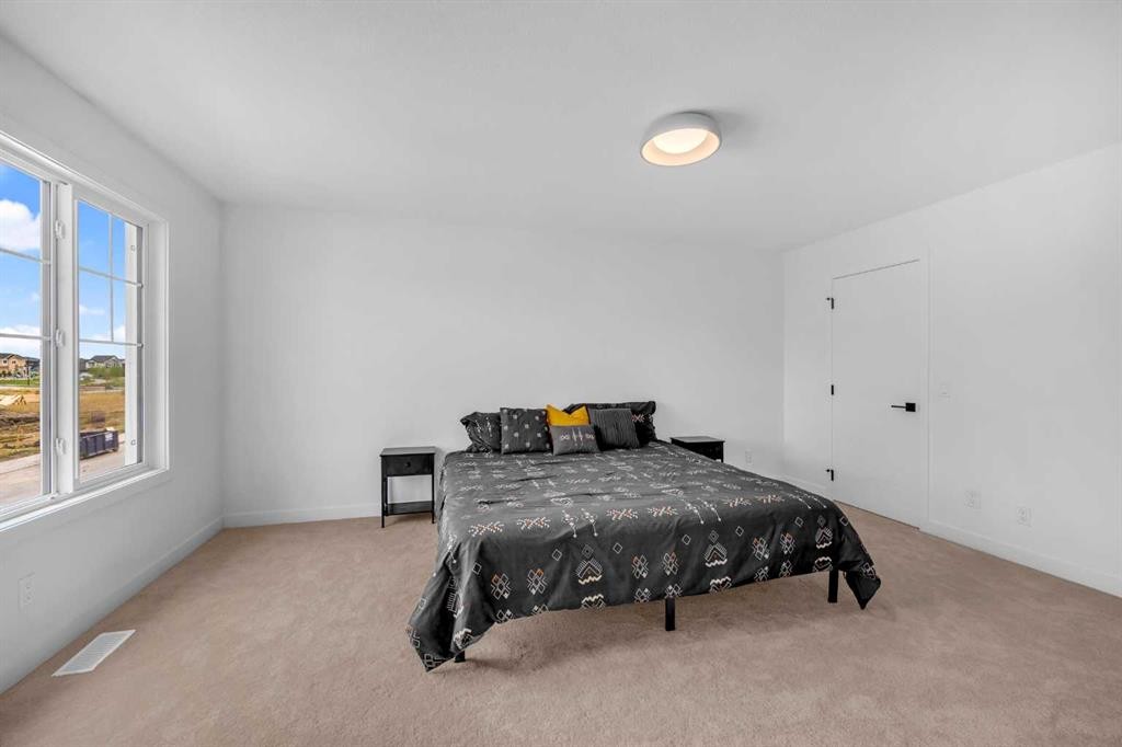 288 Sora Terrace Se, Calgary, AB - Indoor Photo Showing Bedroom