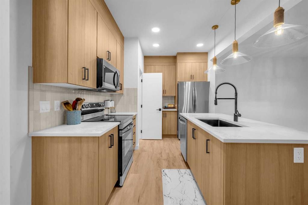 288 Sora Terrace Se, Calgary, AB - Indoor Photo Showing Kitchen With Stainless Steel Kitchen With Upgraded Kitchen