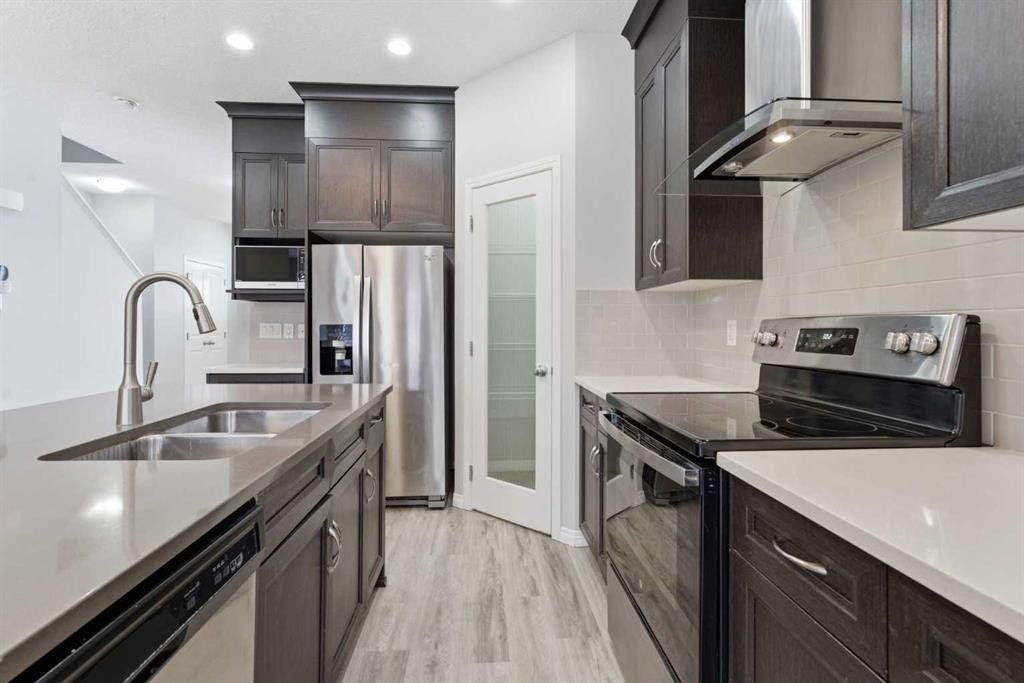 730 Redstone Drive Ne, Calgary, AB - Indoor Photo Showing Kitchen With Double Sink With Upgraded Kitchen