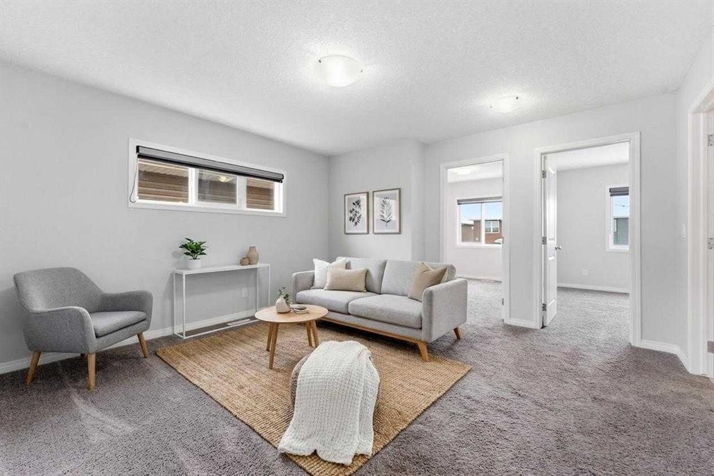 730 Redstone Drive Ne, Calgary, AB - Indoor Photo Showing Living Room