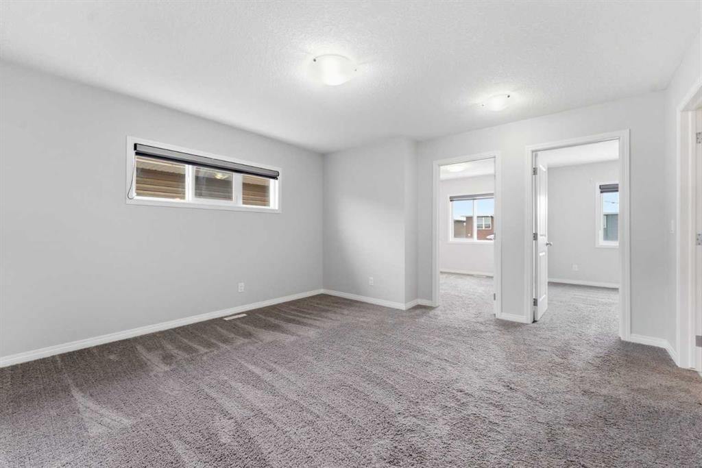 730 Redstone Drive Ne, Calgary, AB - Indoor Photo Showing Other Room