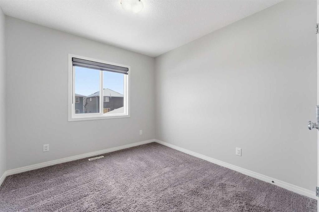 730 Redstone Drive Ne, Calgary, AB - Indoor Photo Showing Other Room