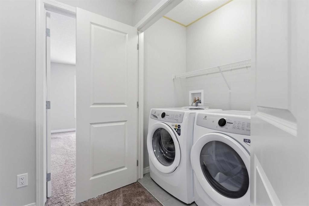 730 Redstone Drive Ne, Calgary, AB - Indoor Photo Showing Laundry Room