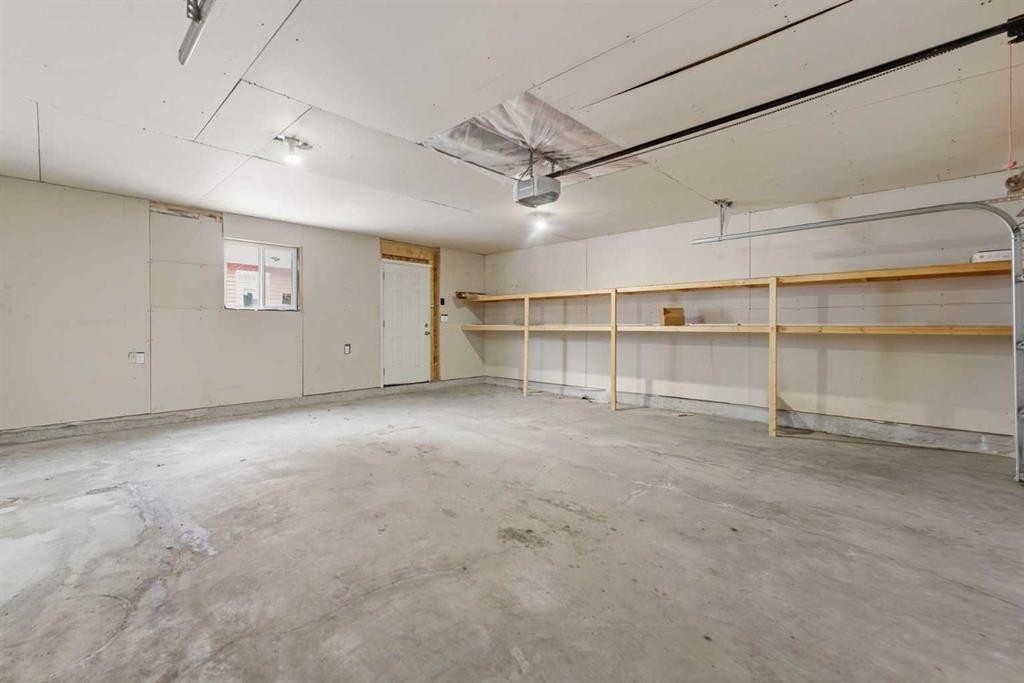 730 Redstone Drive Ne, Calgary, AB - Indoor Photo Showing Garage