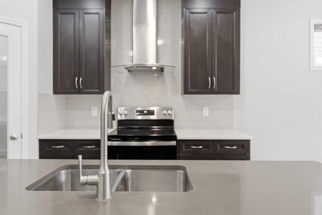 730 Redstone Drive Ne, Calgary, AB - Indoor Photo Showing Kitchen With Double Sink With Upgraded Kitchen