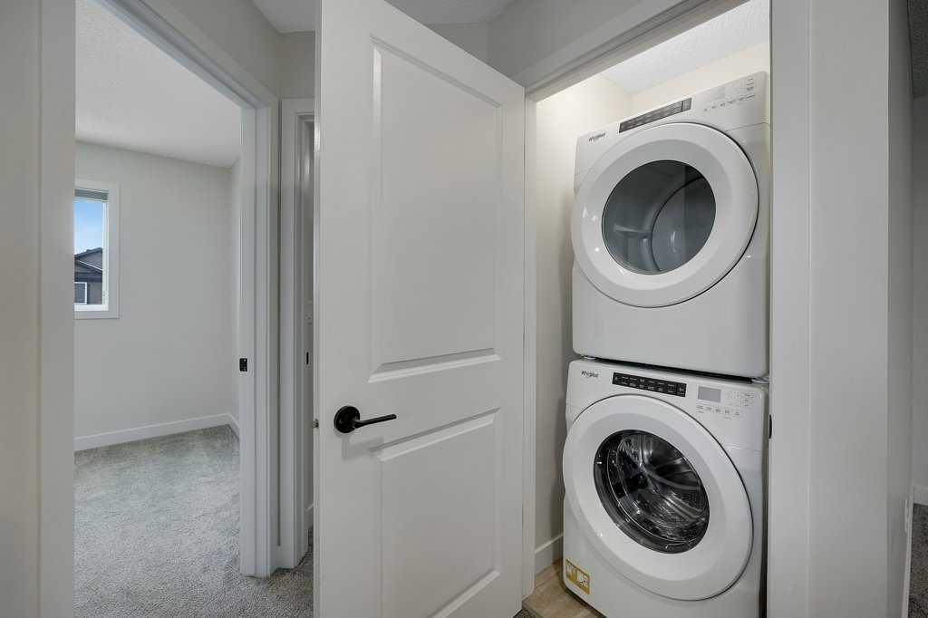 103 Highview Gate Se, Airdrie, AB - Indoor Photo Showing Laundry Room