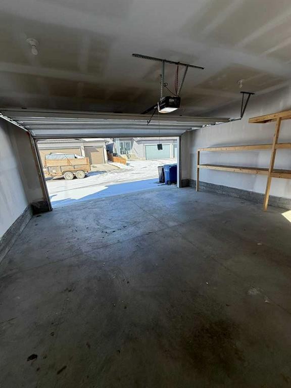 103 Highview Gate Se, Airdrie, AB - Indoor Photo Showing Garage
