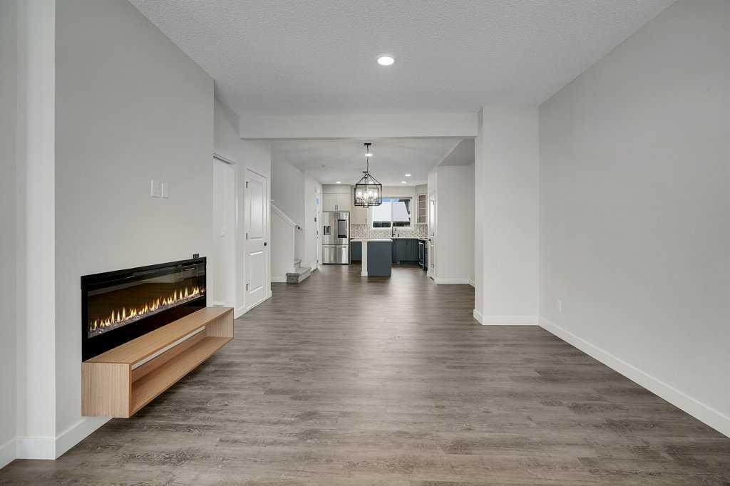 103 Highview Gate Se, Airdrie, AB - Indoor Photo Showing Living Room With Fireplace