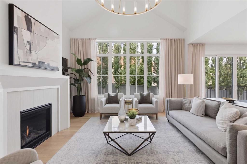 378 Bessborough Drive Sw, Calgary, AB - Indoor Photo Showing Living Room With Fireplace