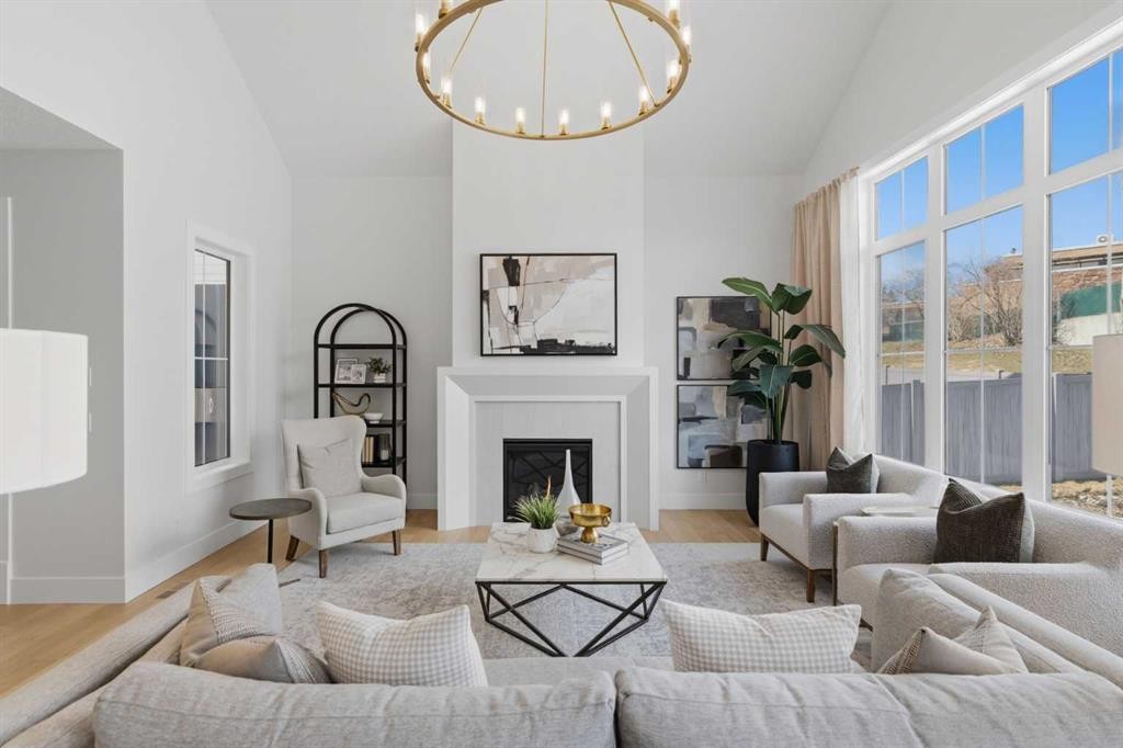 378 Bessborough Drive Sw, Calgary, AB - Indoor Photo Showing Living Room With Fireplace