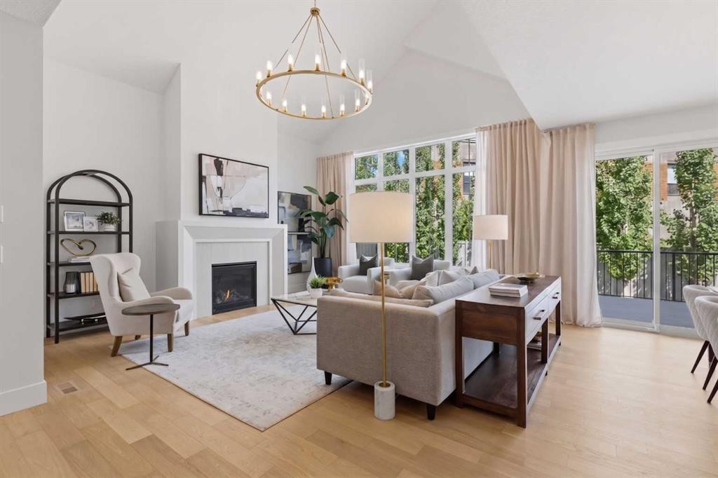 378 Bessborough Drive Sw, Calgary, AB - Indoor Photo Showing Living Room With Fireplace