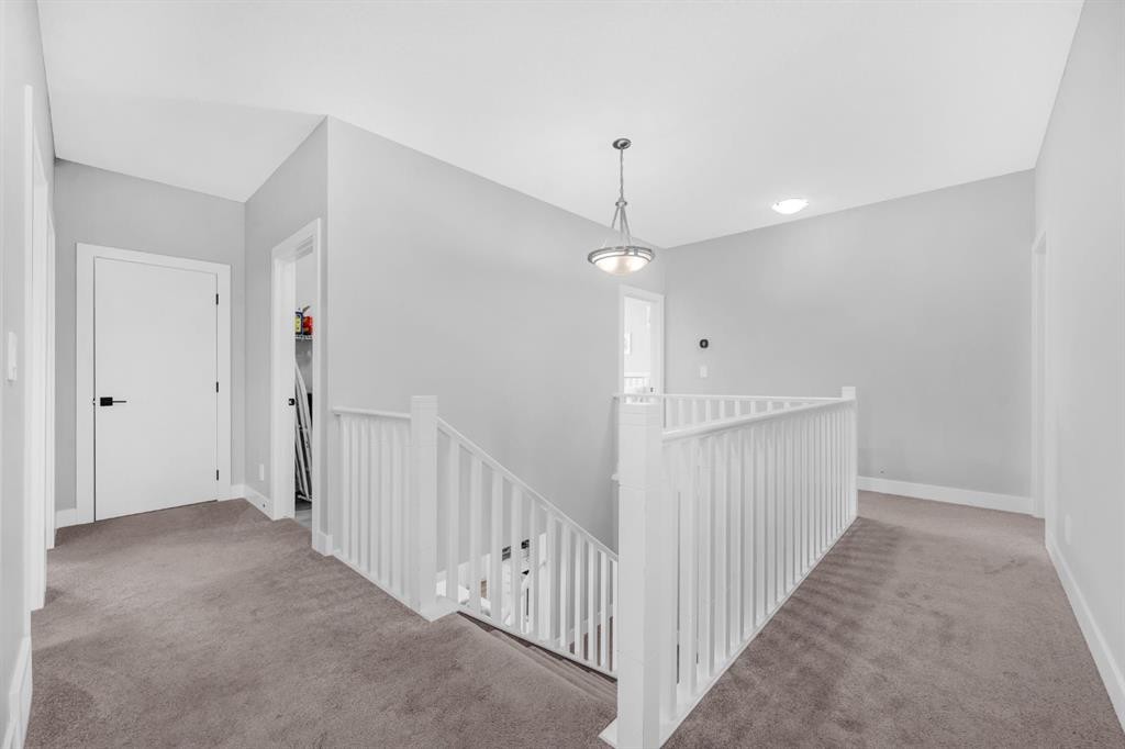 155 Carringham Way Nw, Calgary, AB - Indoor Photo Showing Other Room