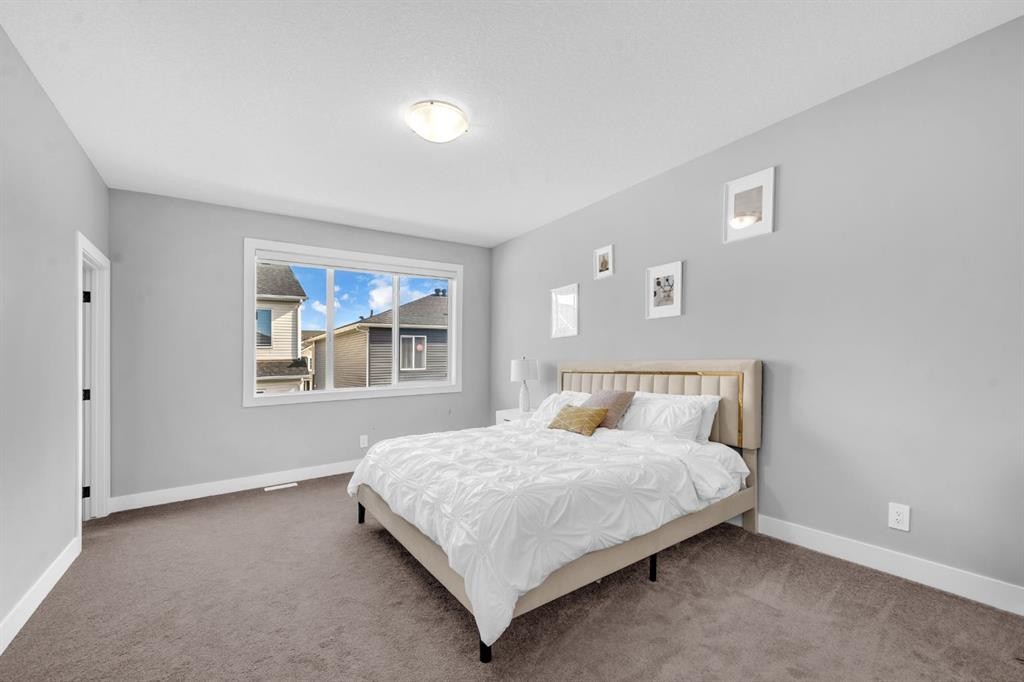 155 Carringham Way Nw, Calgary, AB - Indoor Photo Showing Bedroom