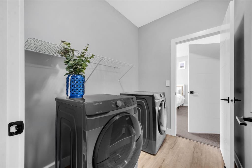 155 Carringham Way Nw, Calgary, AB - Indoor Photo Showing Laundry Room