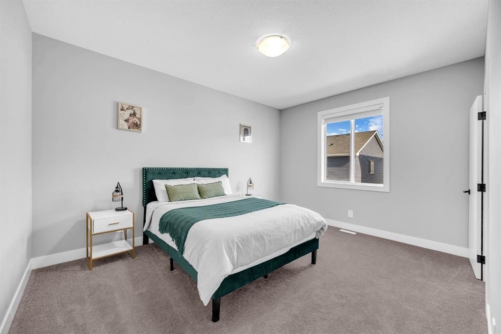 155 Carringham Way Nw, Calgary, AB - Indoor Photo Showing Bedroom
