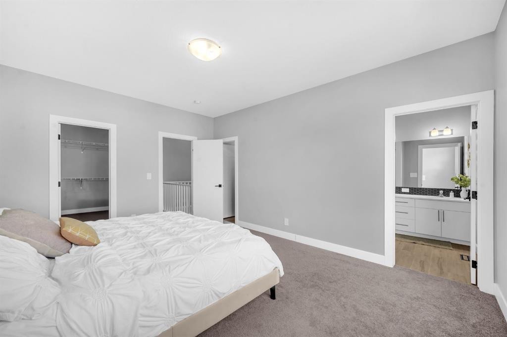 155 Carringham Way Nw, Calgary, AB - Indoor Photo Showing Bedroom