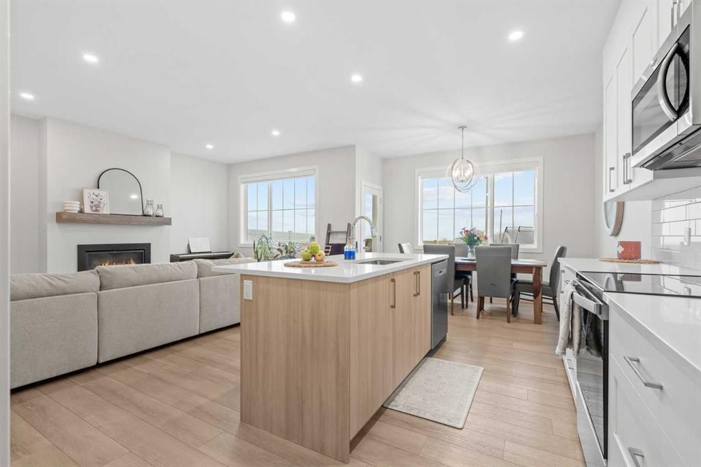 60 Ranchers View, Okotoks, AB - Indoor With Fireplace