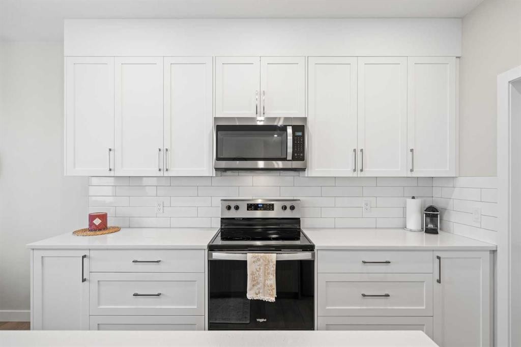 60 Ranchers View, Okotoks, AB - Indoor Photo Showing Kitchen With Upgraded Kitchen