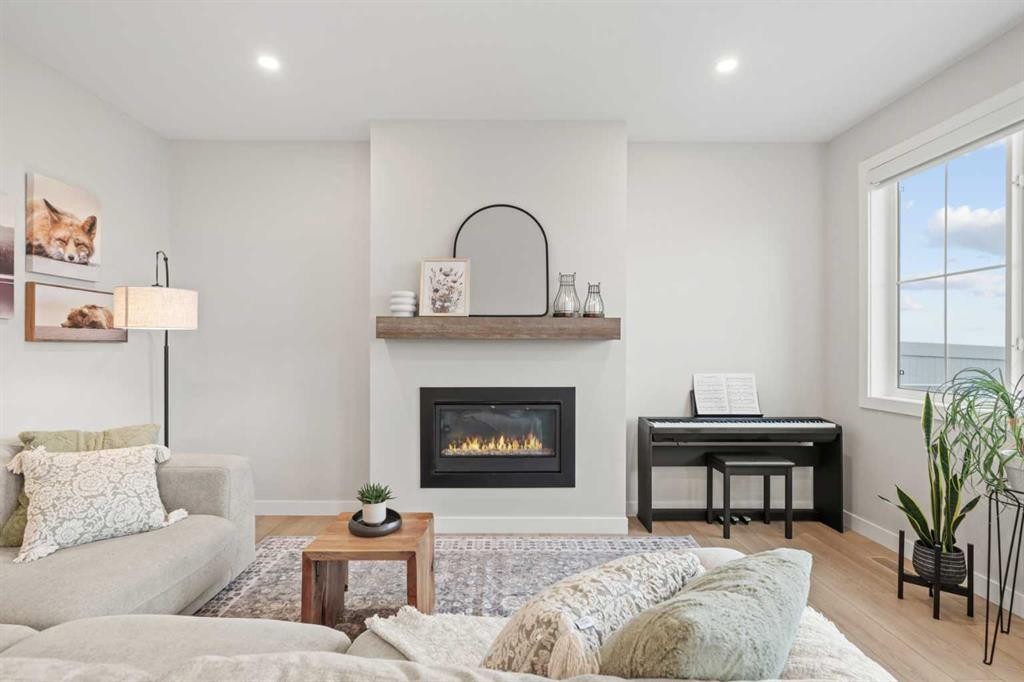 60 Ranchers View, Okotoks, AB - Indoor Photo Showing Living Room With Fireplace
