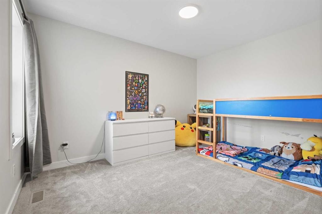 60 Ranchers View, Okotoks, AB - Indoor Photo Showing Bedroom