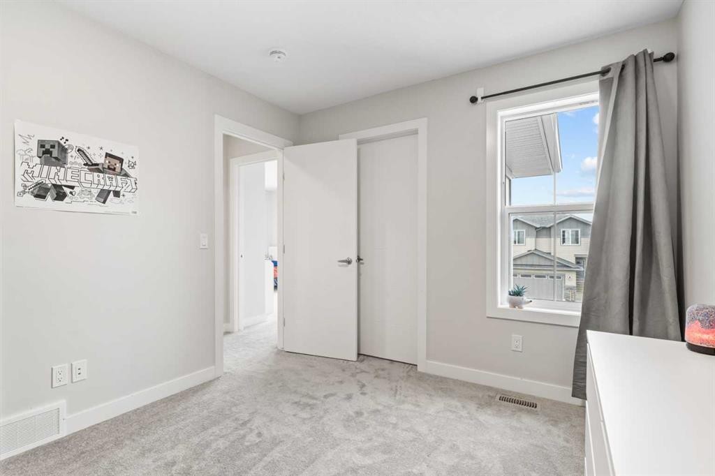60 Ranchers View, Okotoks, AB - Indoor Photo Showing Other Room