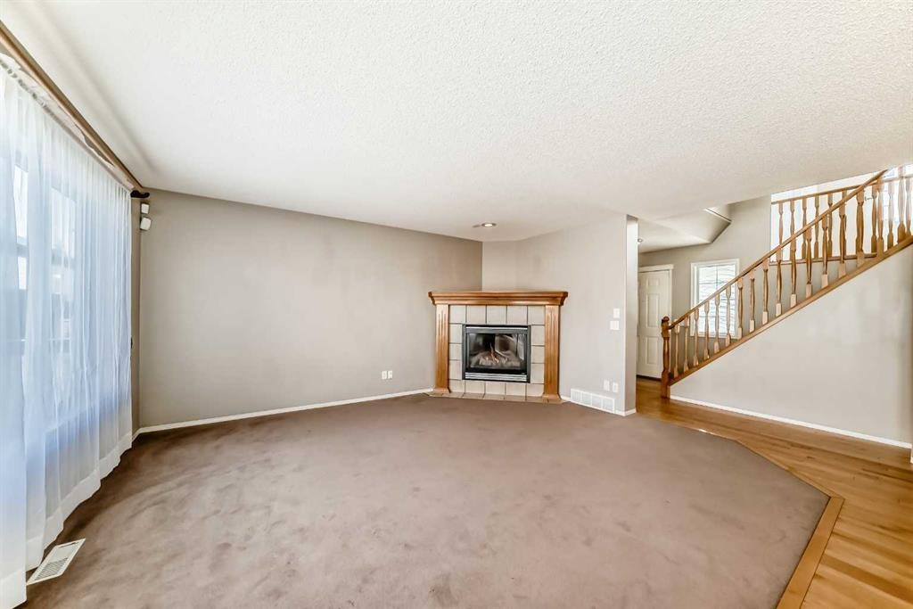 131 Somerside Crescent Sw, Calgary, AB - Indoor With Fireplace
