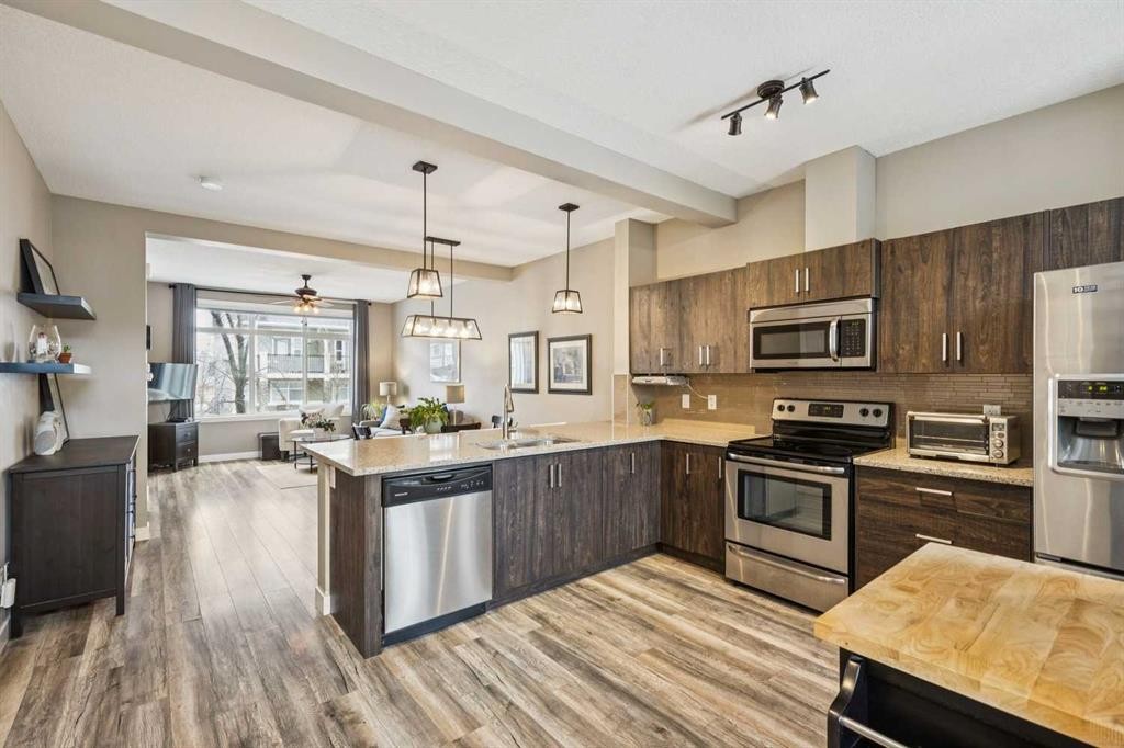 166 Legacy Common Se, Calgary, AB - Indoor Photo Showing Kitchen With Upgraded Kitchen
