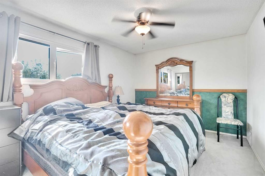 4764 Rundlewood Drive Ne, Calgary, AB - Indoor Photo Showing Bedroom