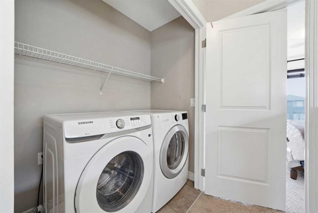 67 Evanspark Road Nw, Calgary, AB - Indoor Photo Showing Laundry Room