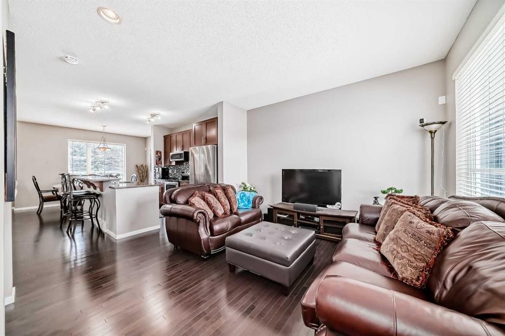 188 Chapalina Square Se, Calgary, AB - Indoor Photo Showing Living Room