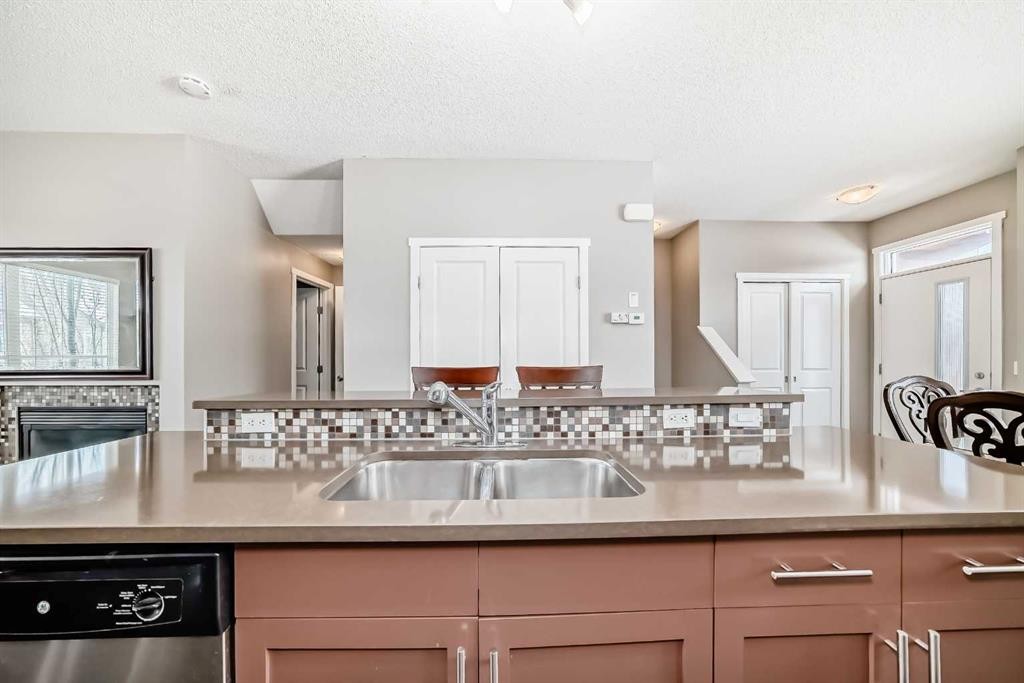 188 Chapalina Square Se, Calgary, AB - Indoor Photo Showing Kitchen With Double Sink