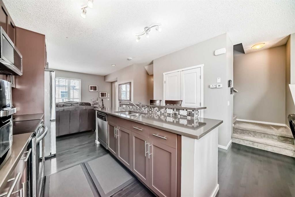 188 Chapalina Square Se, Calgary, AB - Indoor Photo Showing Kitchen With Double Sink With Upgraded Kitchen