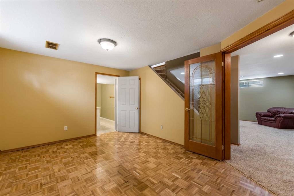 9 Mckenzie Place Se, Calgary, AB - Indoor Photo Showing Other Room