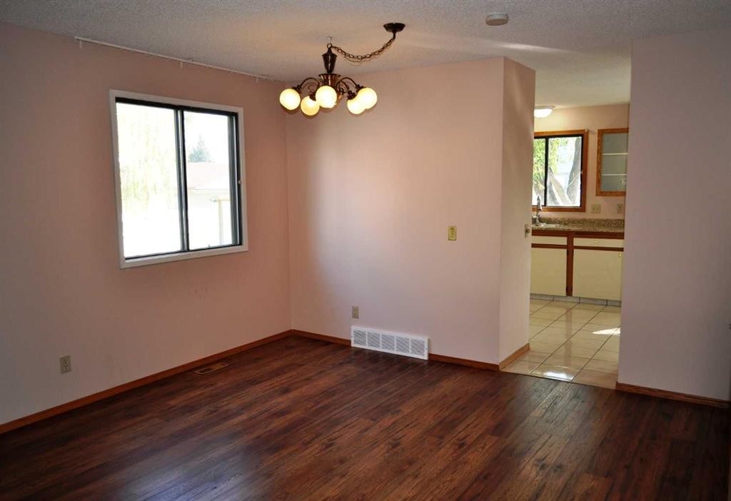 319 Woodside Circle Sw, Calgary, AB - Indoor Photo Showing Other Room