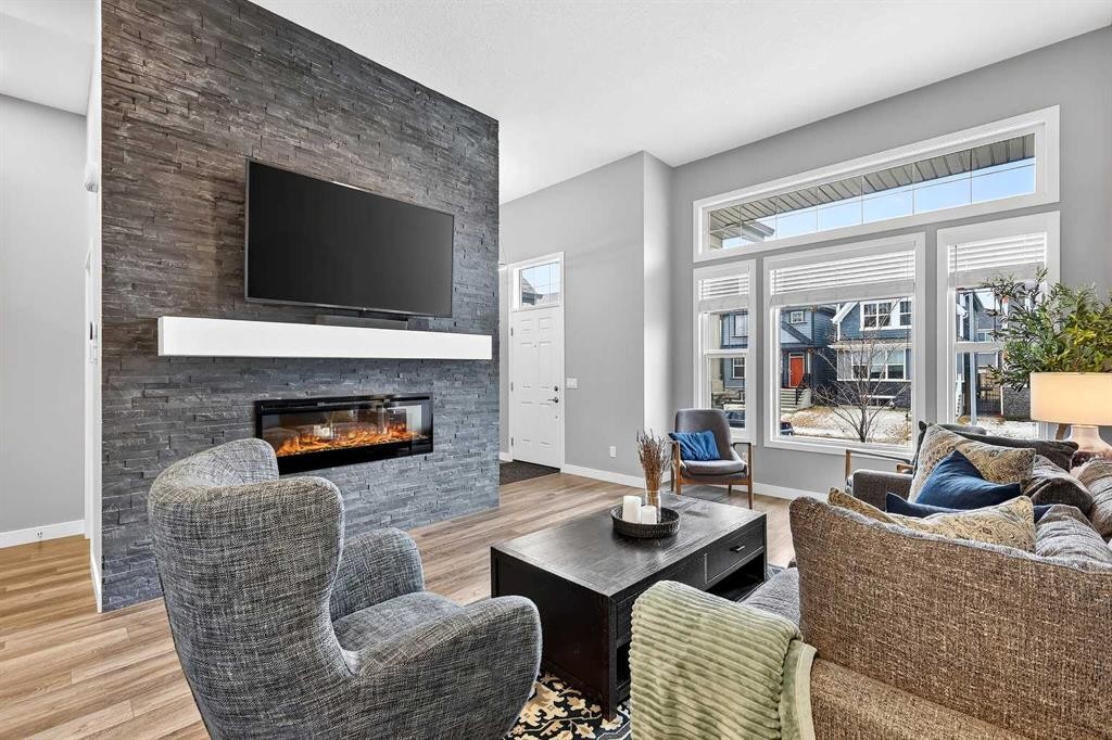 322 Masters Row Se, Calgary, AB - Indoor Photo Showing Living Room With Fireplace