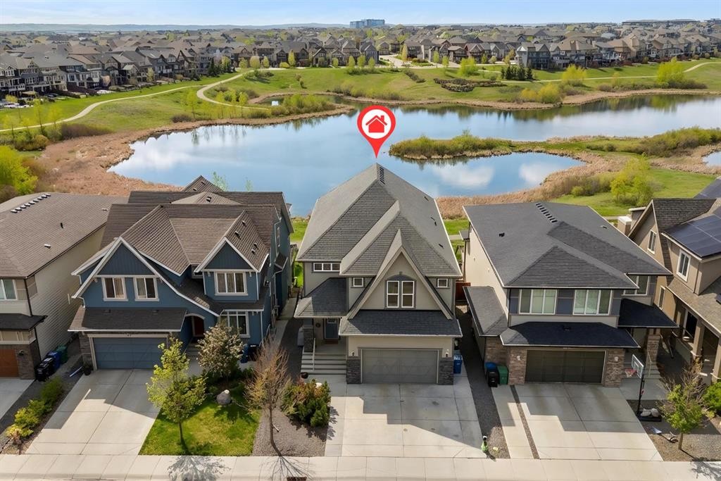 121 Marquis View Se, Calgary, AB - Outdoor With Body Of Water With Facade