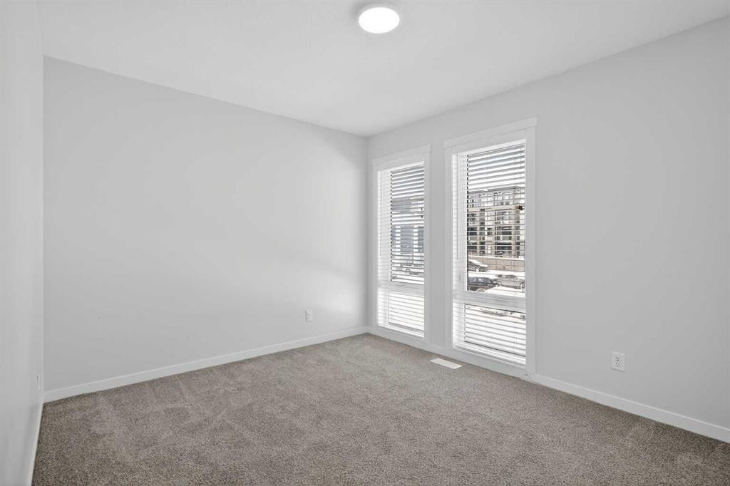 306-338 Seton Circle Se, Calgary, AB - Indoor Photo Showing Other Room