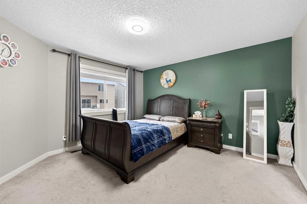 148 Walden Square Se, Calgary, AB - Indoor Photo Showing Bedroom
