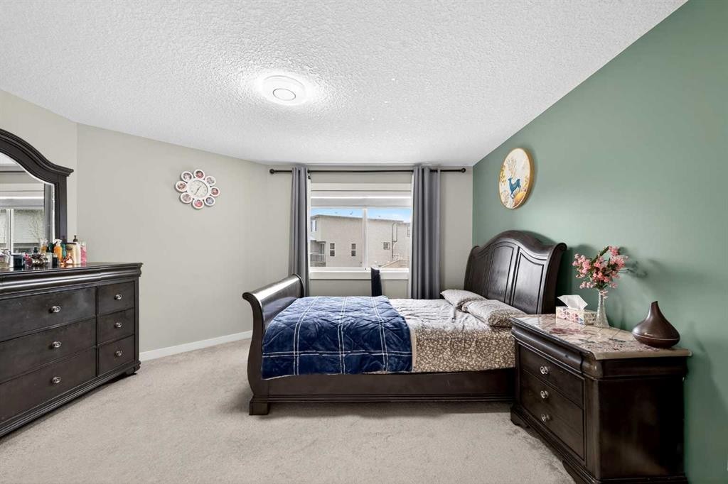 148 Walden Square Se, Calgary, AB - Indoor Photo Showing Bedroom